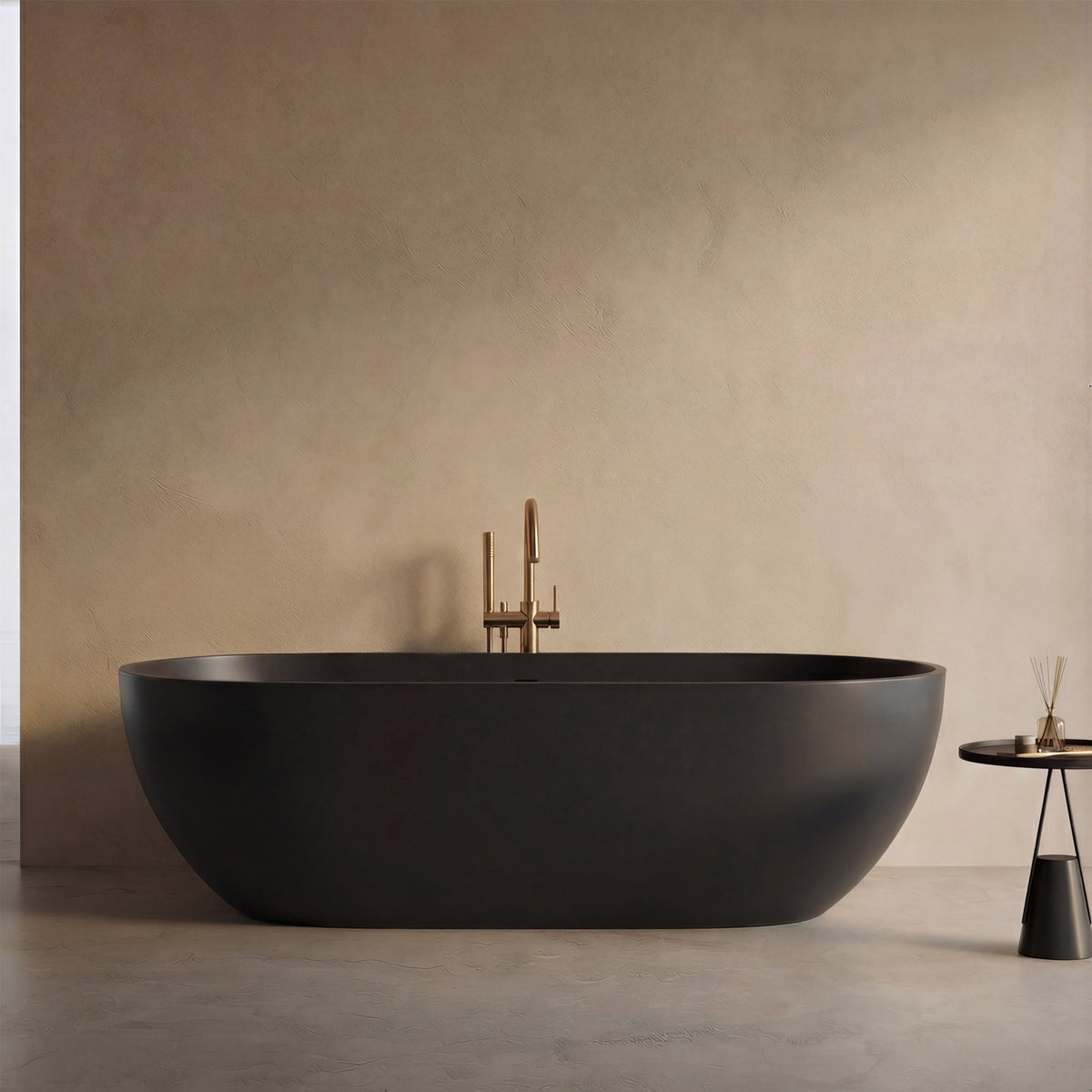 AURELLE 69-inch minimalist oval freestanding solid surface bathtub in matte black with gold floor-mounted faucet