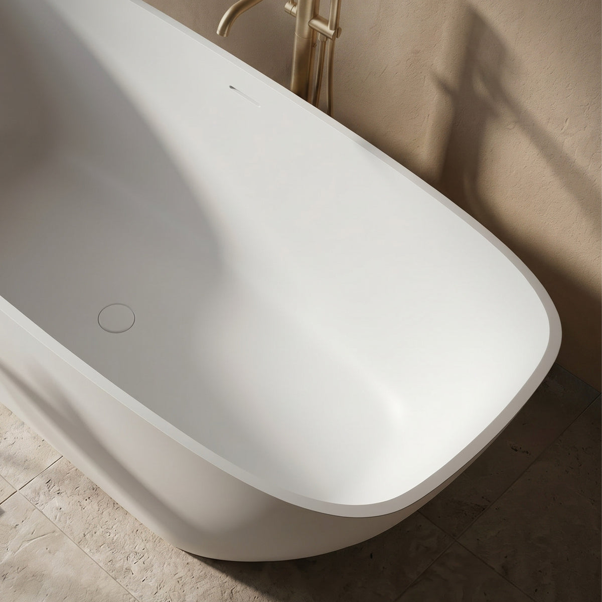 LYCARA freestanding solid surface soaking bathtub with smooth white oval interior and overflow drain