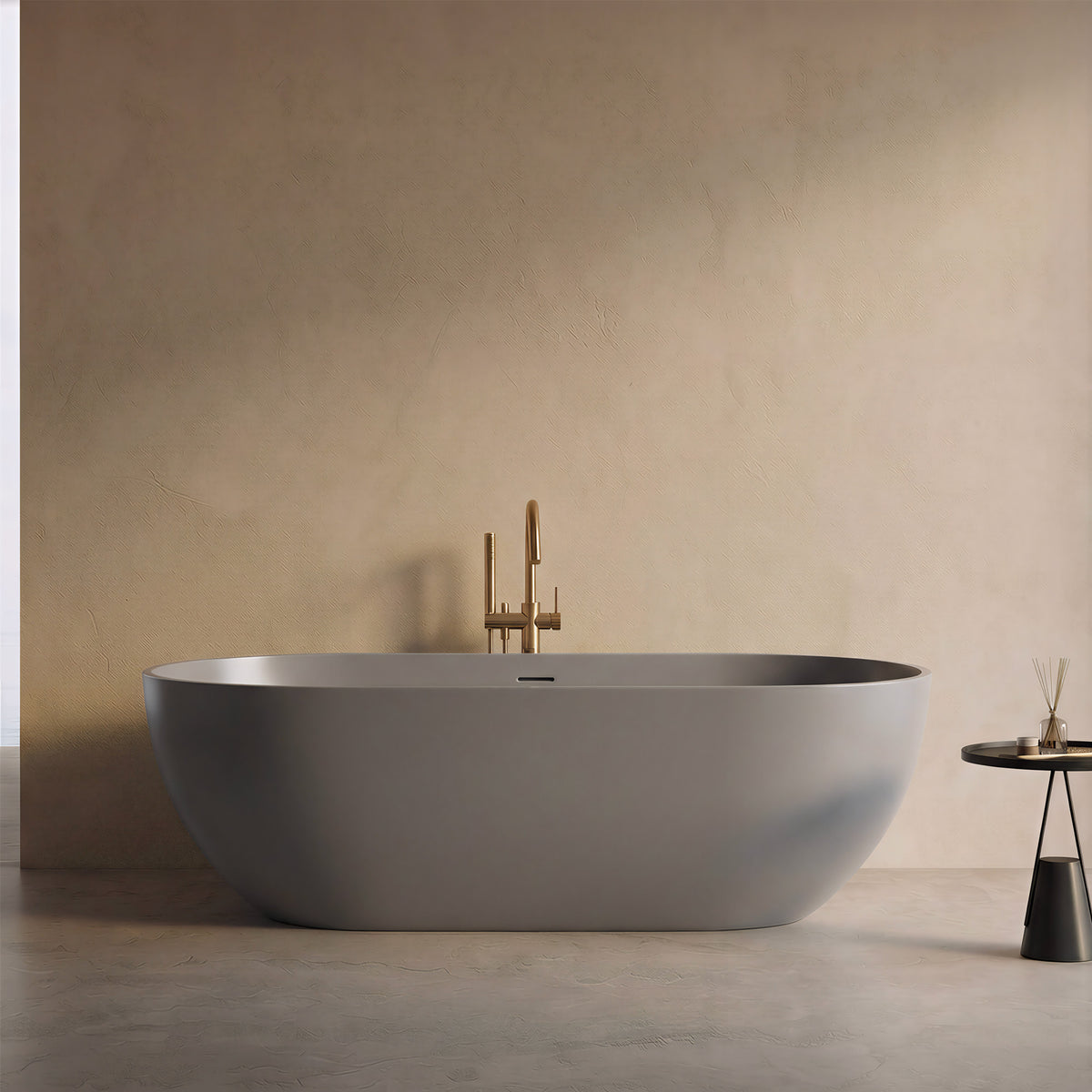 OBSIDIAN 59-inch freestanding solid surface soaking tub in matte gray with brushed gold floor-mounted faucet