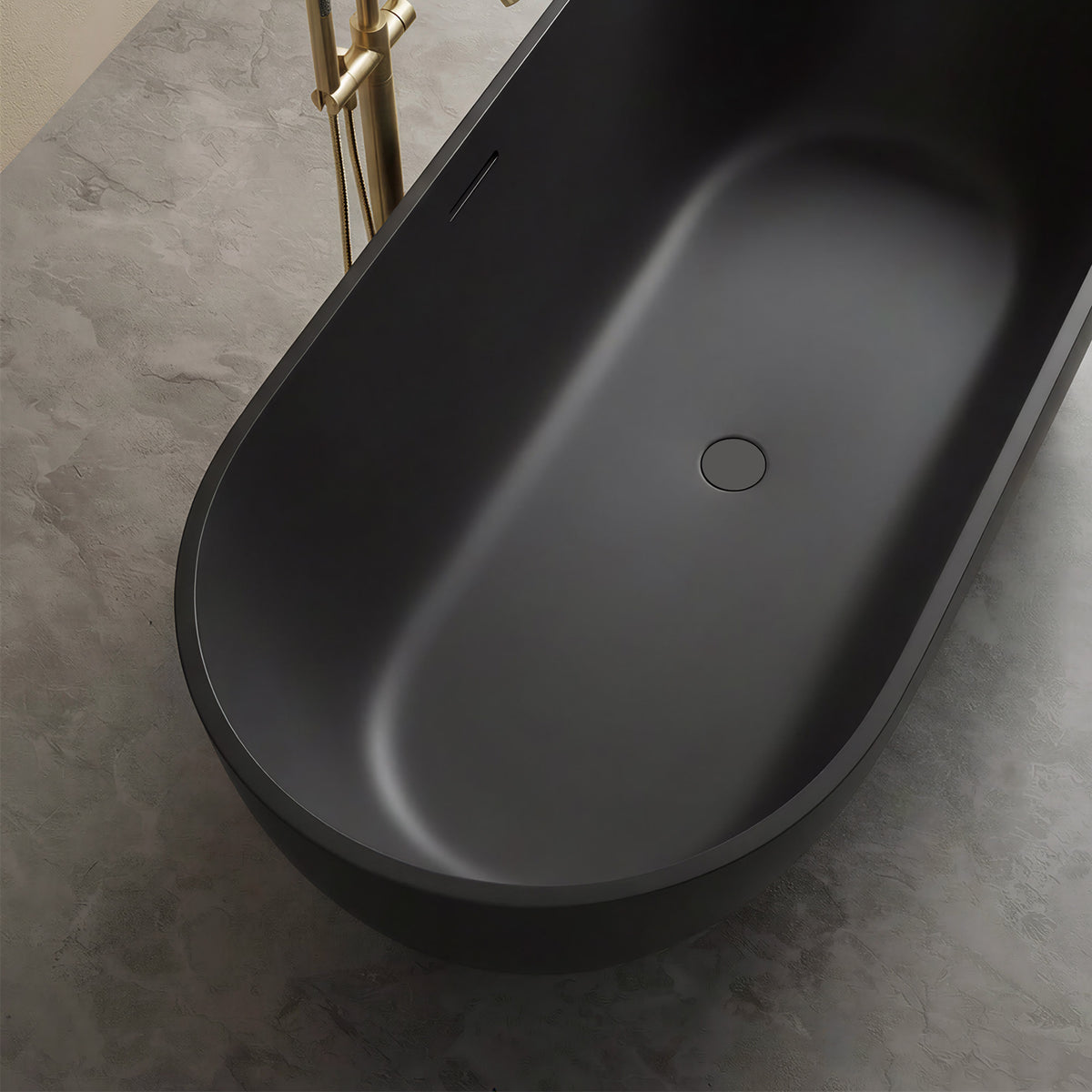 OBSIDIAN freestanding solid surface soaking tub in matte black with oval shape and overflow drain